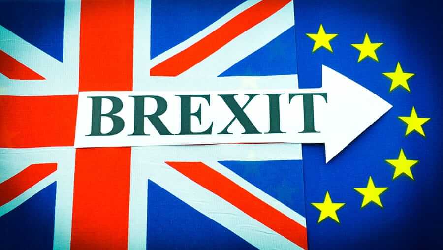 BREXIT representation with UK flag, European Union flag and the word BREXIT with an arrow pointing to the right. copyright Lucian Milasan